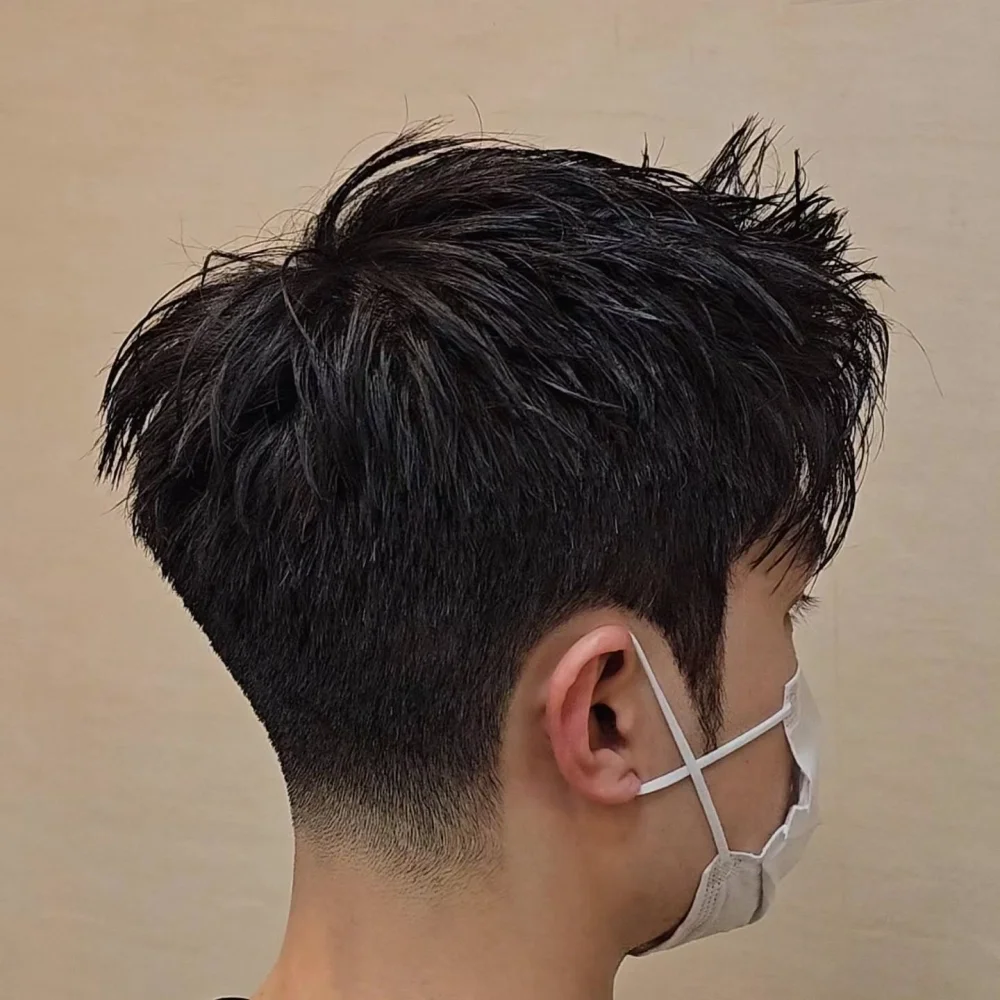 Tóc nam undercut uốn phồng tạo vẻ ngoài bồng bềnh